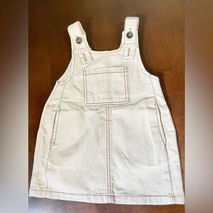 Beige dress with brown stitching